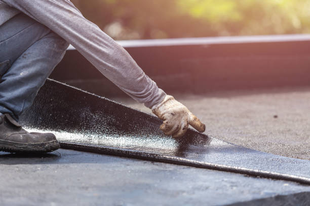 Professional Waterproofing technician working in Westbury, NY